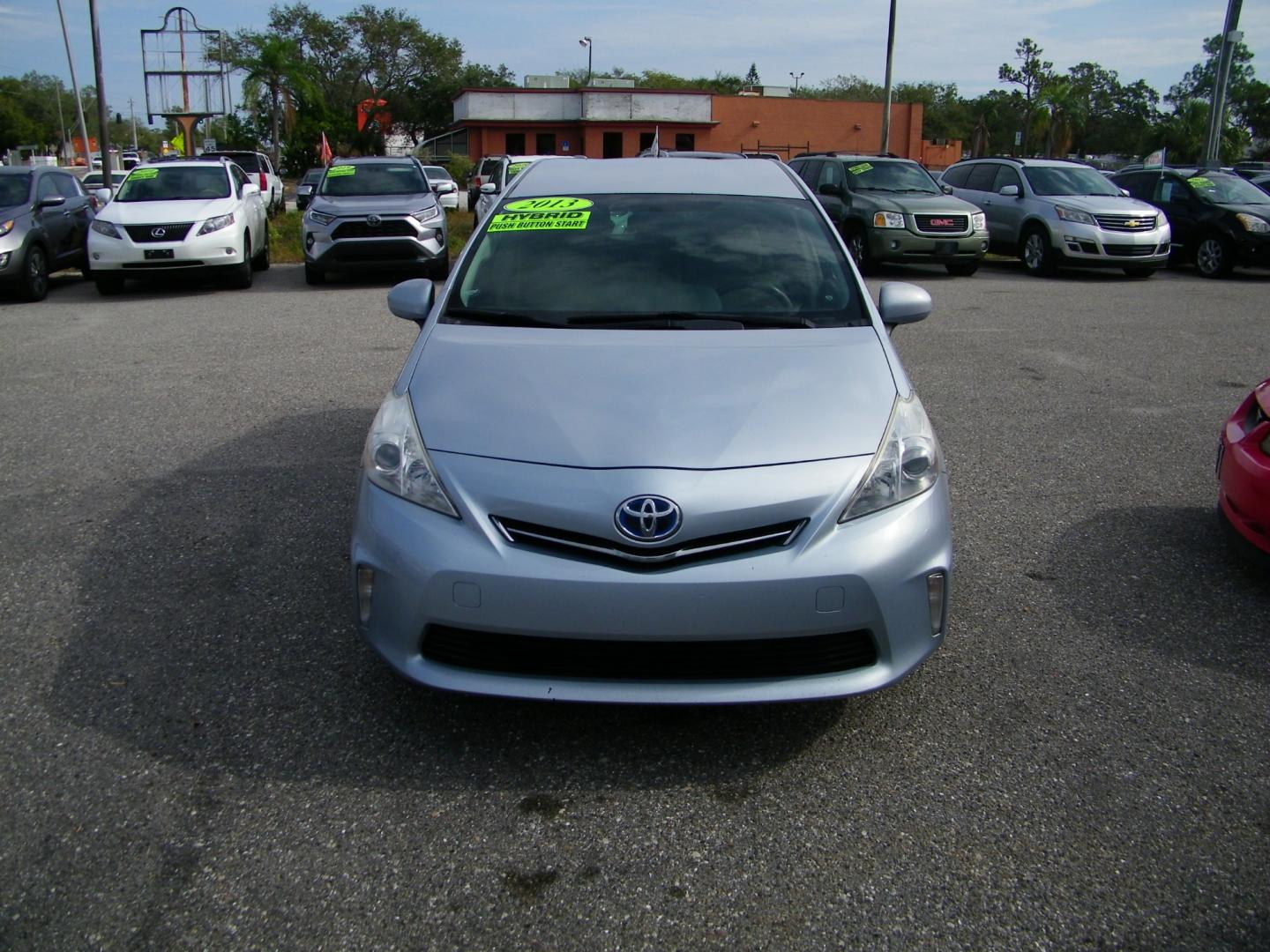 2013 Silver /Beige Toyota Prius V Three (JTDZN3EU5D3) with an 1.8L L4 DOHC 16V HYBRID engine, Continuously Variable Transmission transmission, located at 4000 Bee Ridge Road, Sarasota, FL, 34233, (941) 926-0300, 27.298664, -82.489151 - Photo#2